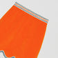 Orange mini skirt made of velvet with a wavy finish. 