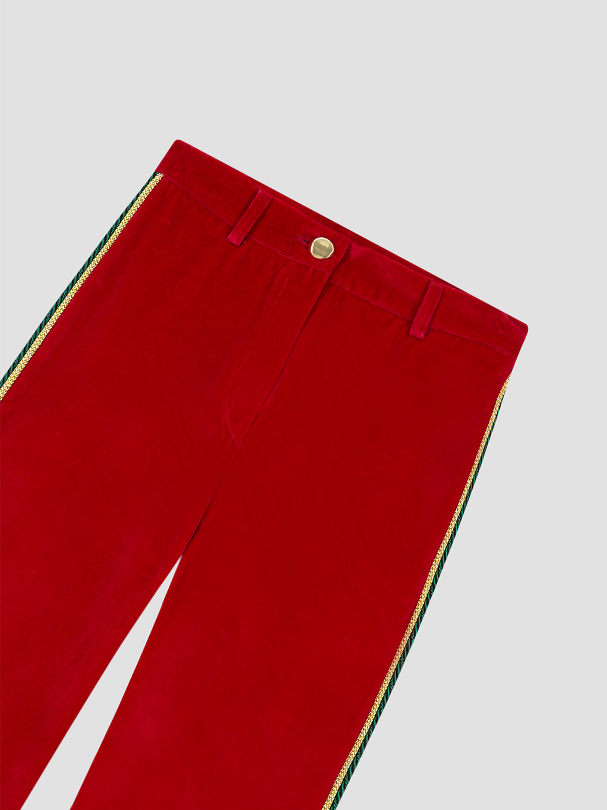 Red velvet pants with green and gold trimming  