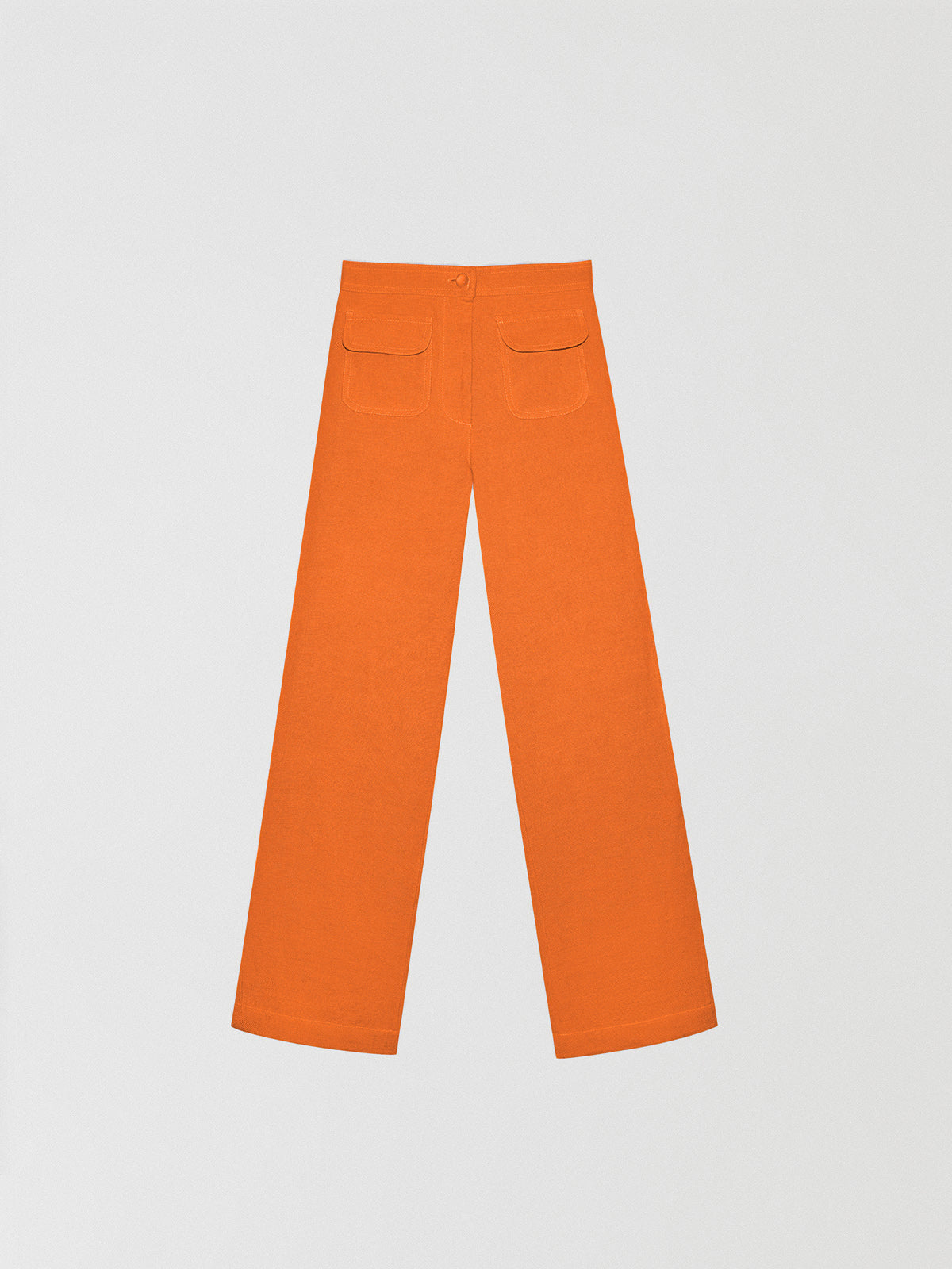 Orange high-waisted linen trousers with pockets. 