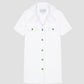 Loto Towel Dress White is a white towel dress with green buttons on the front.