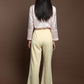 Baby yellow low rise corduroy trousers.