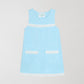 Fringes Mini Towel Celeste is a light blue dress made with towel fabric and white bangs on the pockets, chest and skirt.