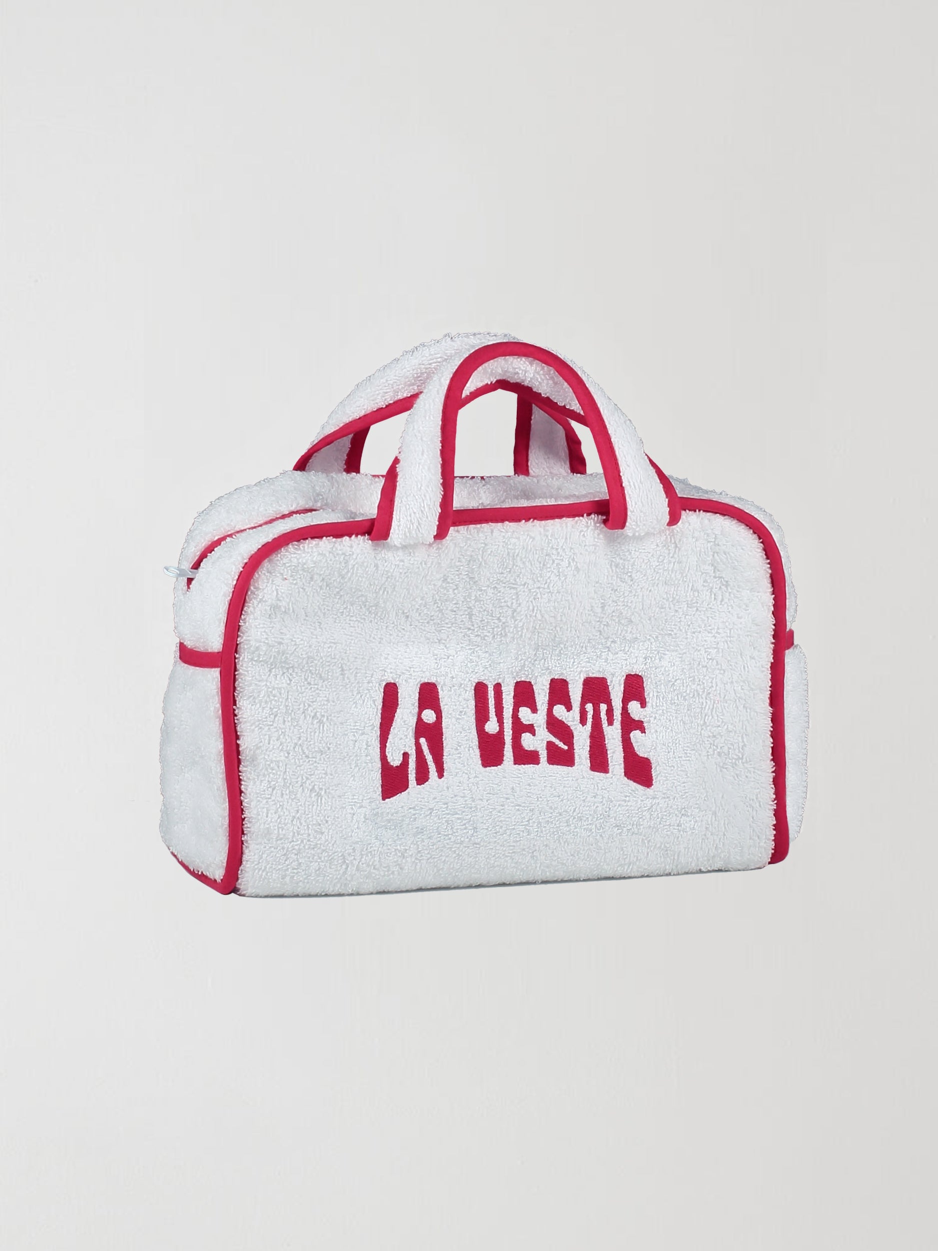 Mini Terry Towel Bag Red is a towel bag with La Veste details and logo on face ideal for any occasion.