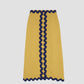 Midi skirt made in yellow linen with navy trim detail