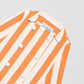 Women's orange and white striped jacket with matching XL button fasteners