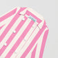 Women's pink and white striped jacket with matching white XL buttons