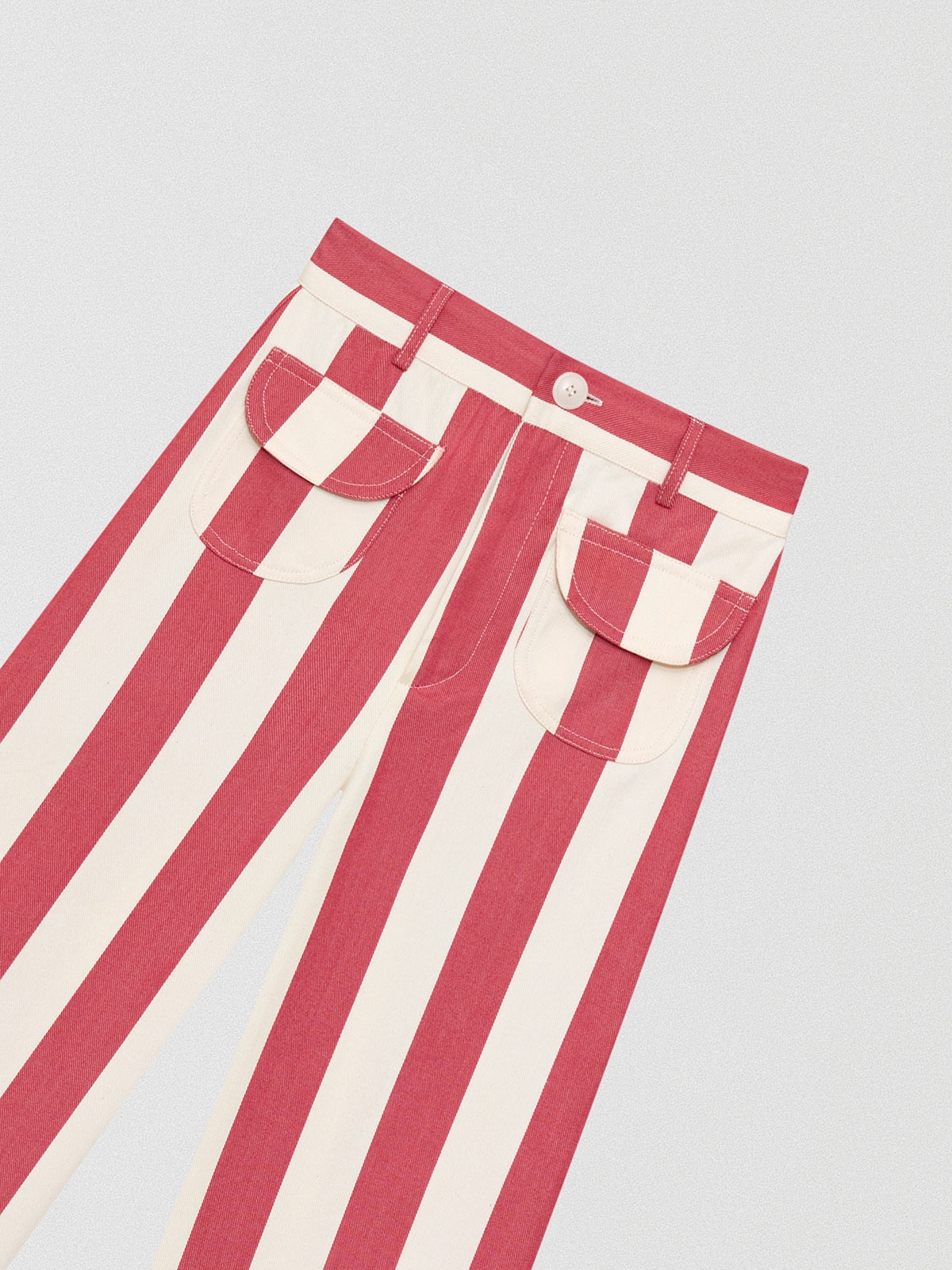 Red high-waisted trousers printed in cotton with red and ecru stripes.