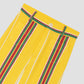 Yellow high-waisted printed trousers in cotton with red and green stripes. 