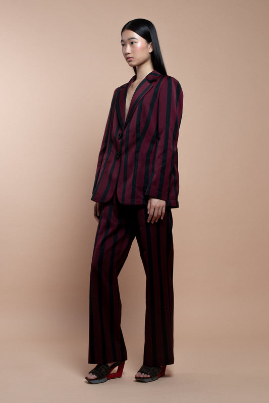 Burgundy and black striped suit trousers.