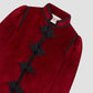 Red velvet jacket with black trimmings