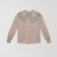 Brown and white vichy check shirt made of cotton with blue and green yarn detail on the collar