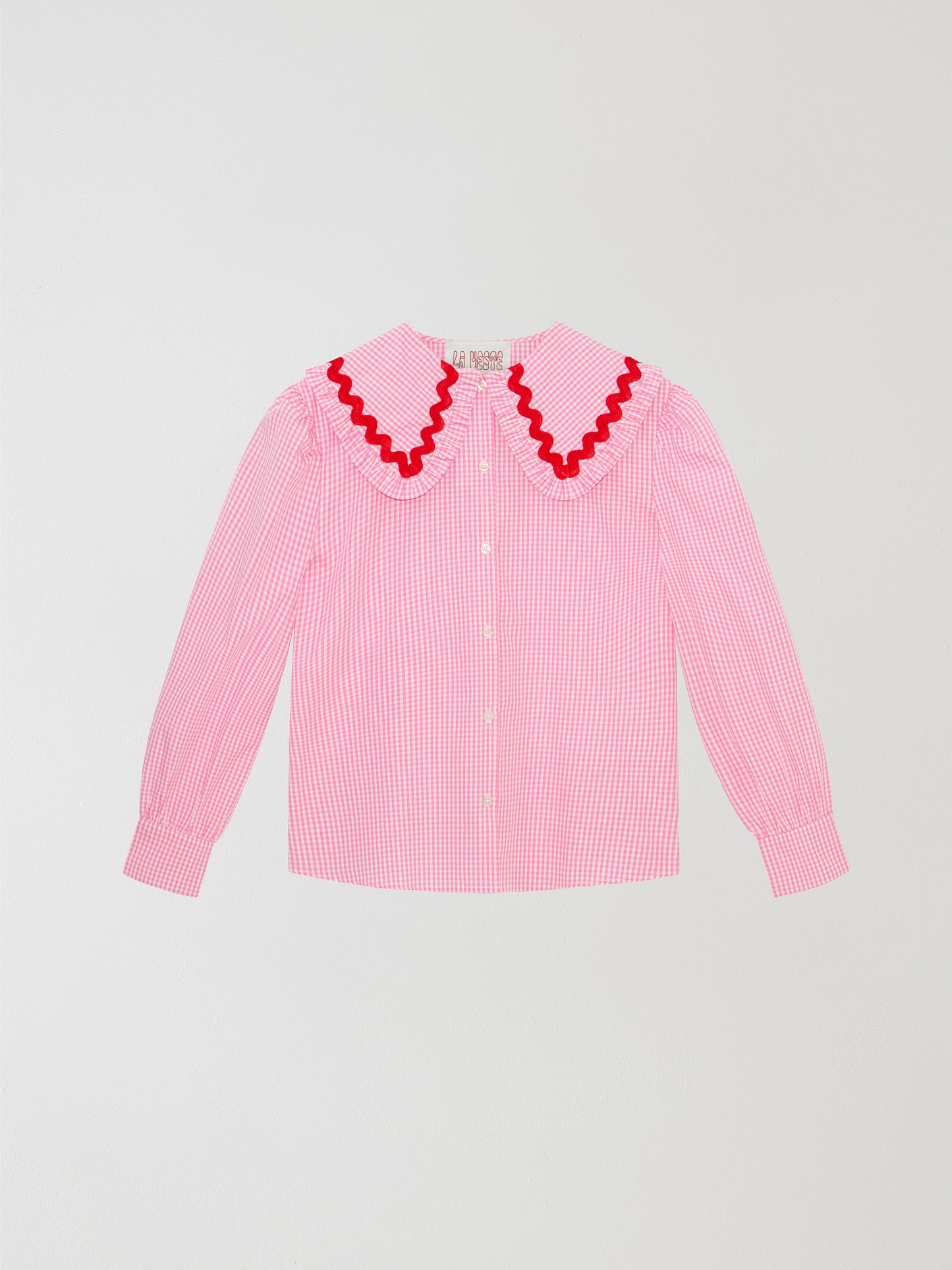 Pink and white vichy check shirt made of cotton with red trim detail on the collar