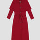 Sirimiri Trench Red is a mid-length red trench coat with red lined belt and flared skirt.