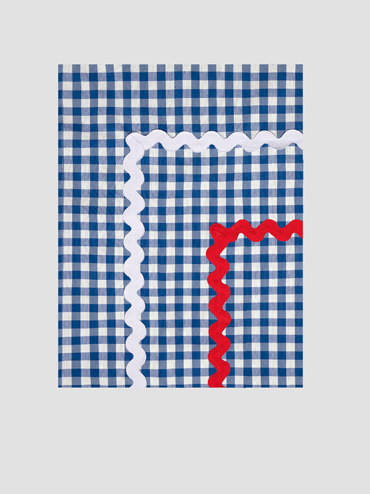 Rectangular tablecloth made of blue and white vichy check cotton with red and white trim