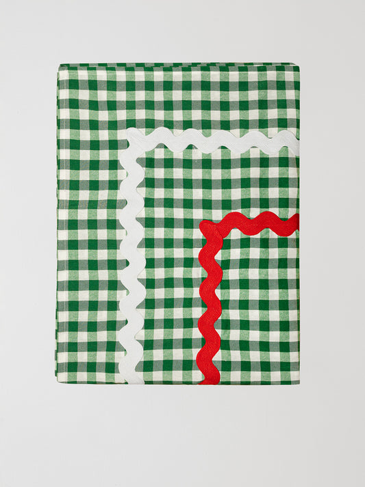 Rectangular tablecloth made of green and white vichy check cotton with white and red trim
