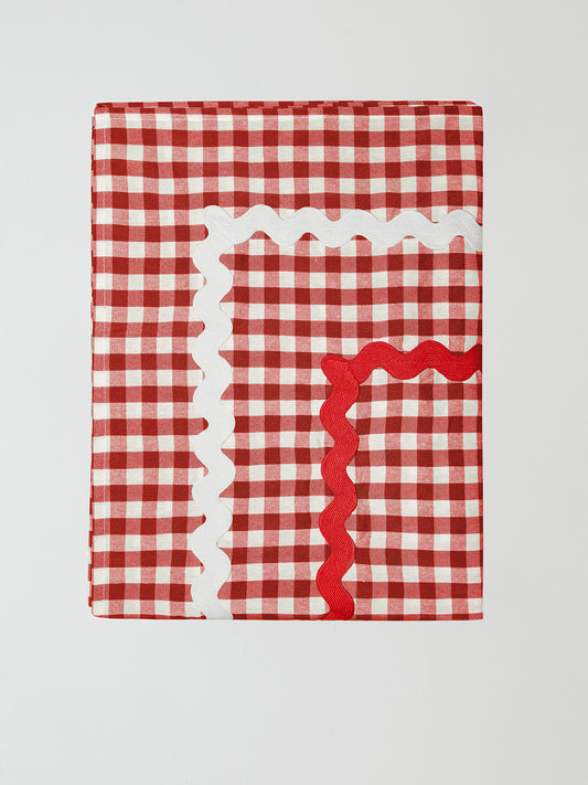 Rectangular tablecloth made of red and white vichy check cotton with white and red trim