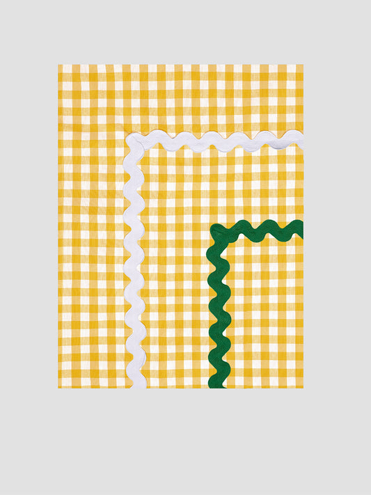 Rectangular tablecloth made of yellow and white vichy check cotton with white and white and green trim