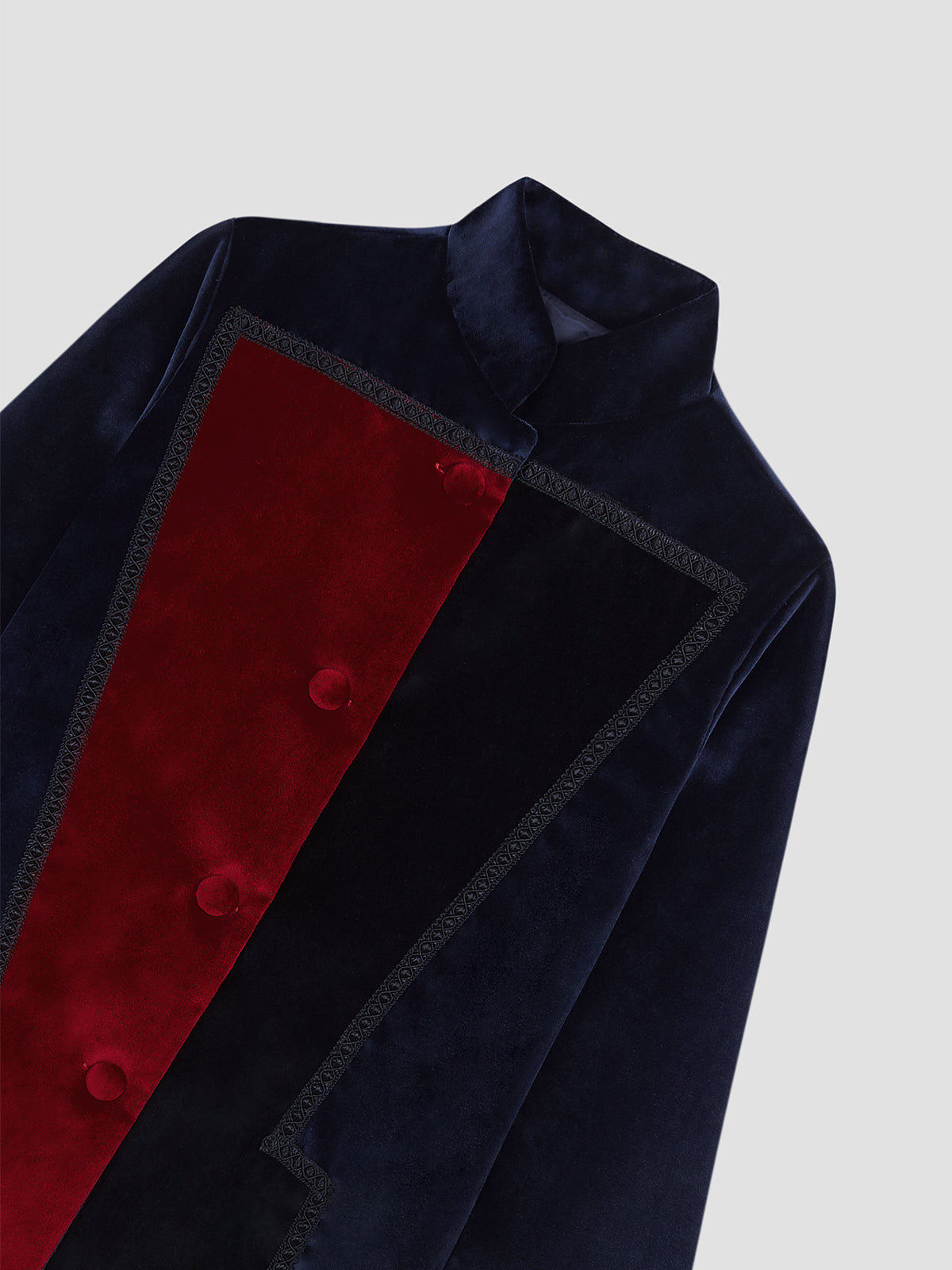 Red, navy and black velvet blazer with geometric design on the front