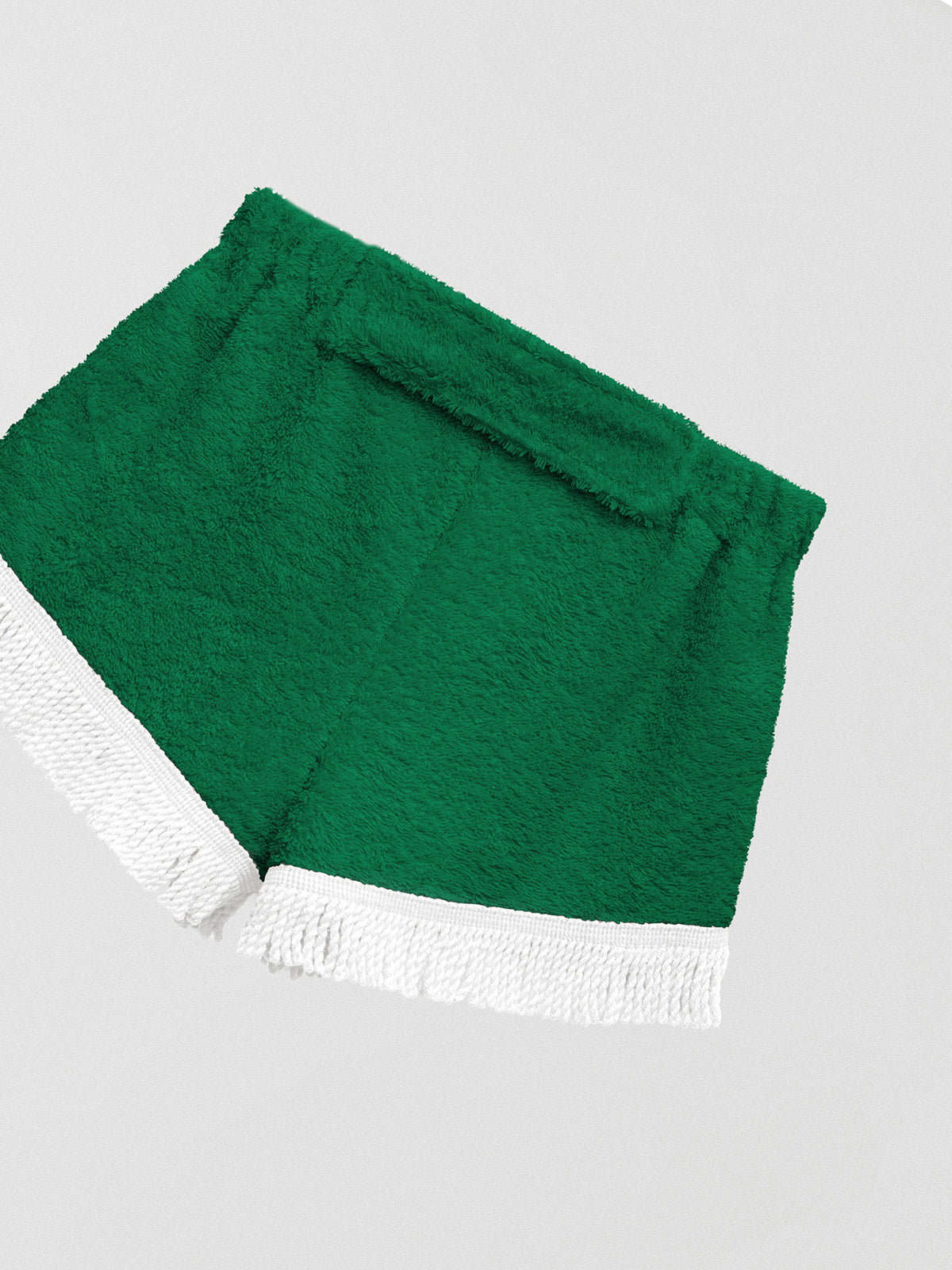 Towel shorts made in green cotton with white fringe.