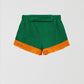 Towel shorts made in green cotton with orange fringe.