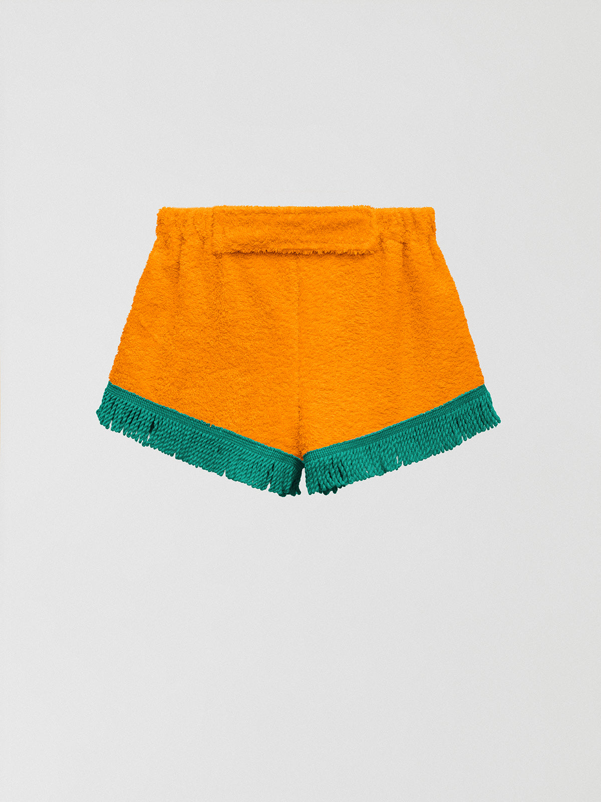 Towel shorts made in orange cotton with green fringes. 
