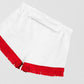 Towel shorts made in white cotton with red fringes. 