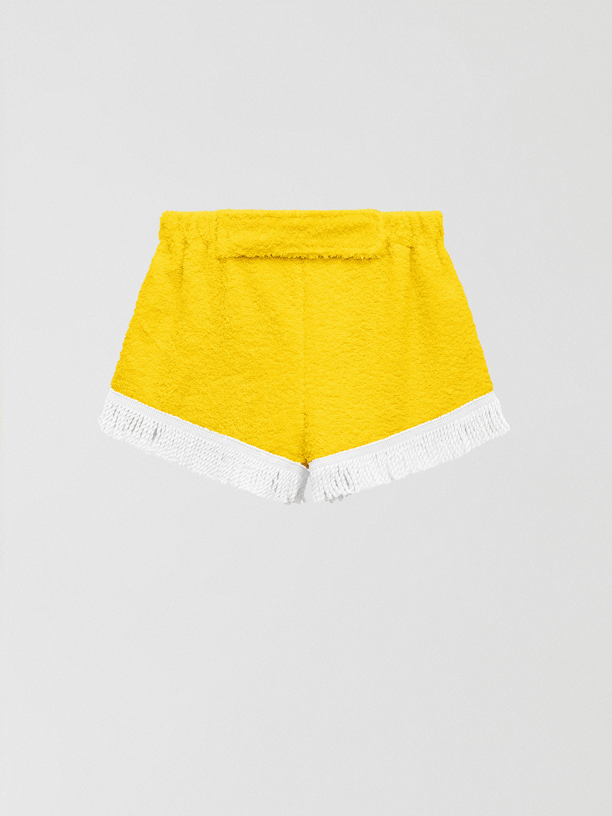 Towel shorts made in yellow cotton with white fringes. 